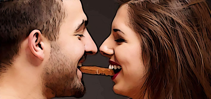 homme et femme croquent ensemble la meme gaufrette